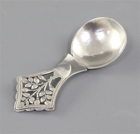 A George V Arts & Crafts silver Tree of Life caddy spoon, by Henry George Murphy, Length 99mm Weight 0.9oz/31grms